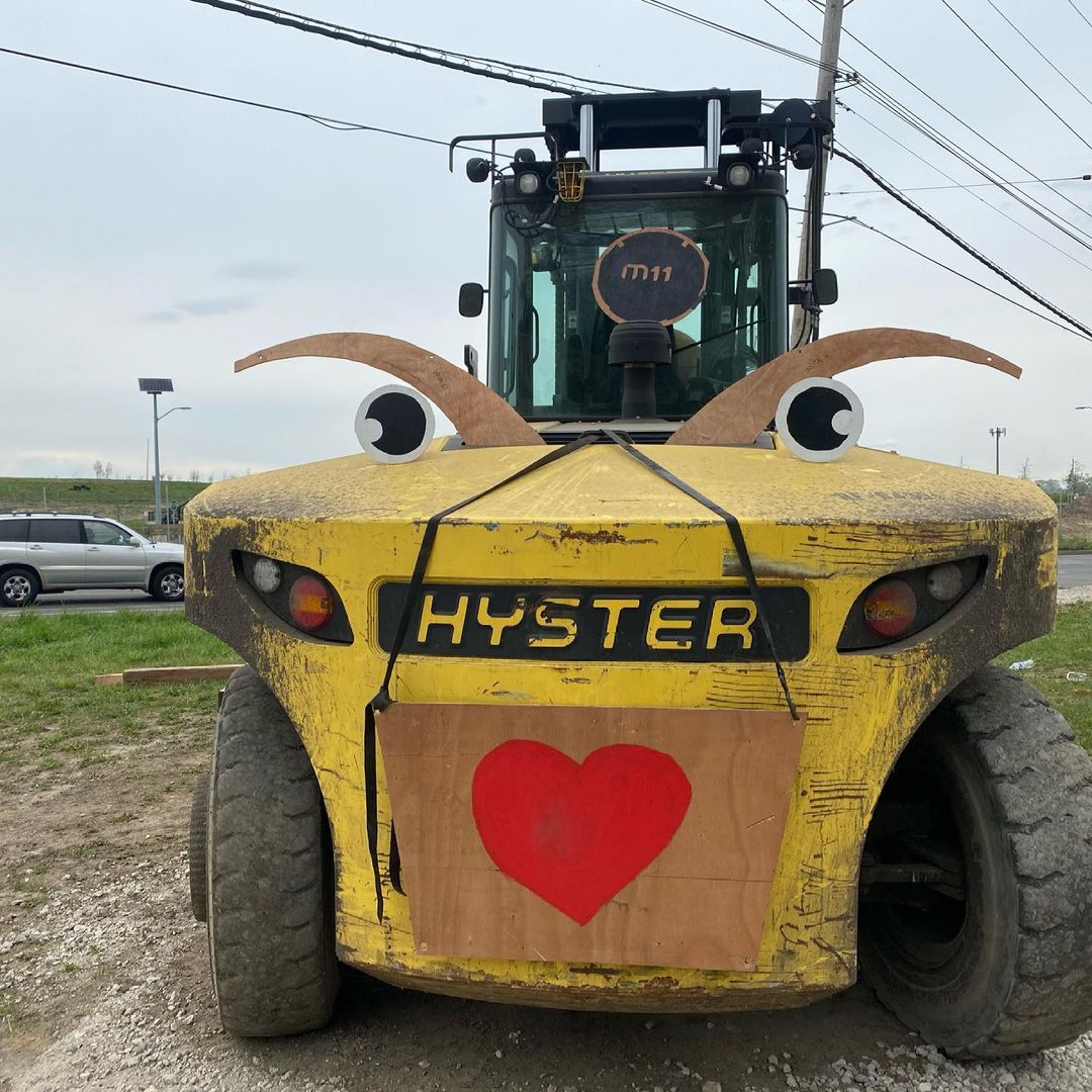 We couldn’t help but to decorate the giant forklift while the longshoreman went …