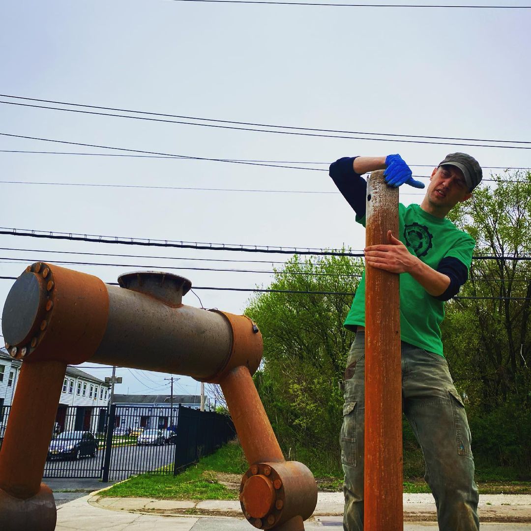 Here is Jason lubing up the robot’s pole in anticipation of the final installati…