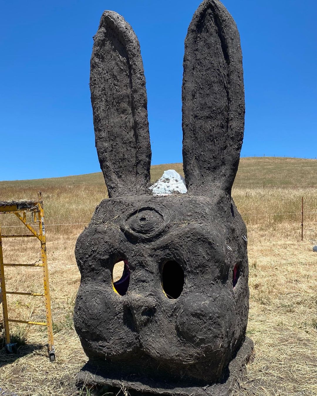 The head for the 30 foot adobe bunny is ready to be stacked “TEMPLE OF HARVEY ” …