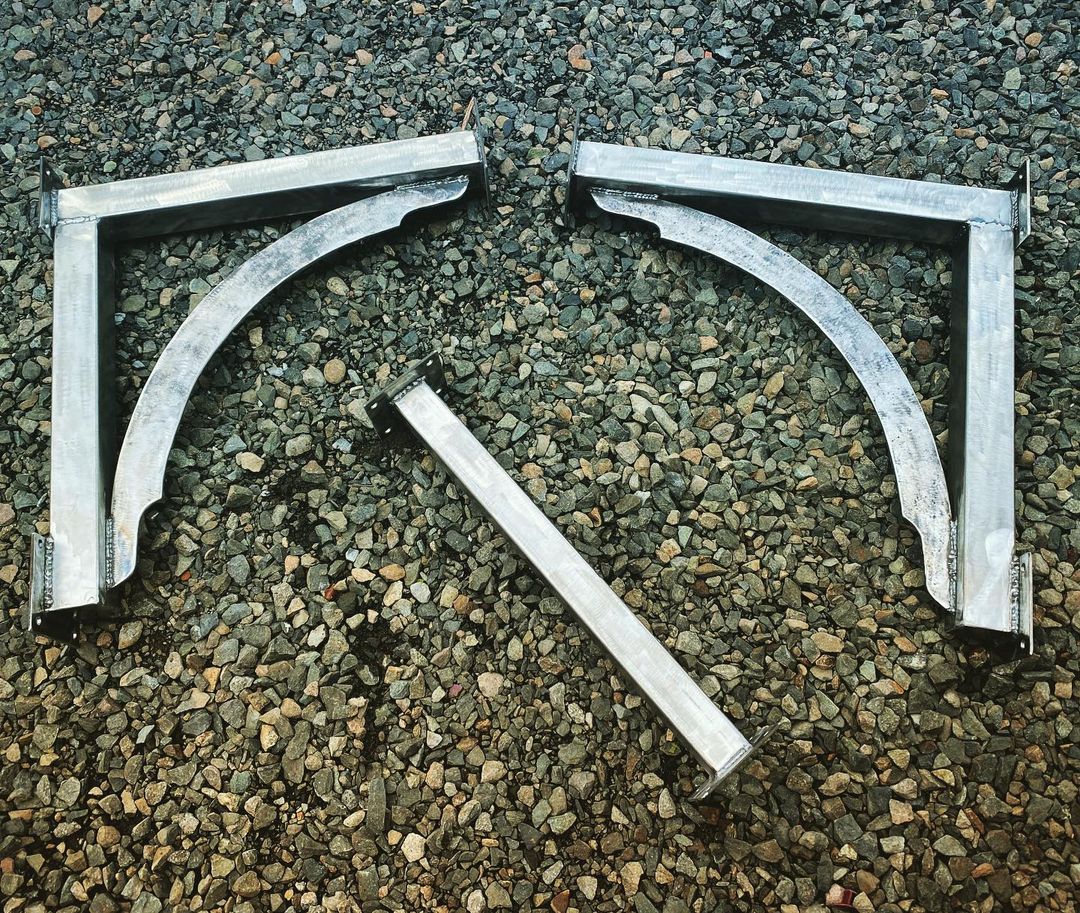 A couple custom brackets for a wooden wisteria trellis.  Just dropped them off a…