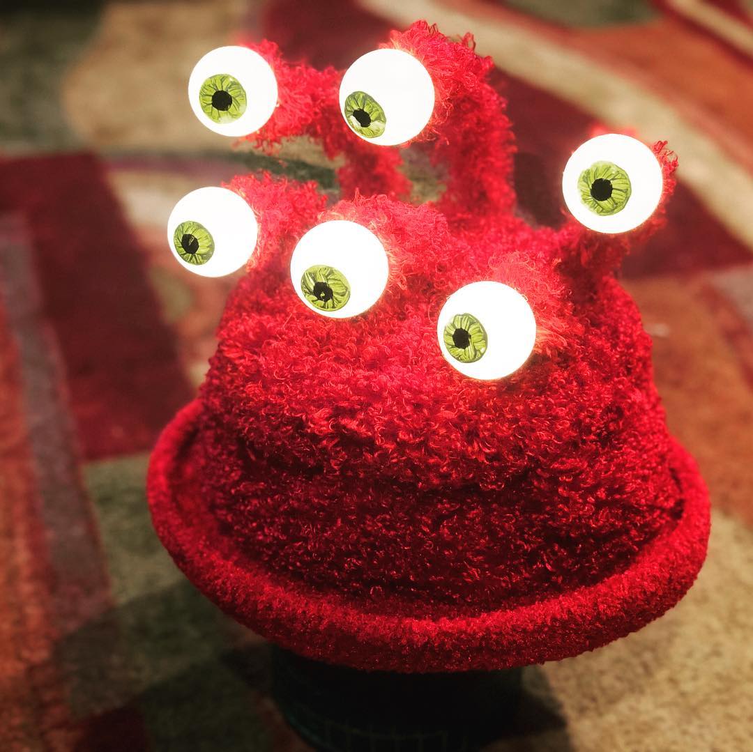 Current completed project: 6 glowing-eyed creature hat for an annual hat/white e…